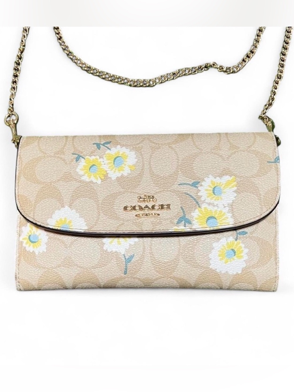 Coach Gemma bag in Signature
Canvas with a Daisy print crossbody